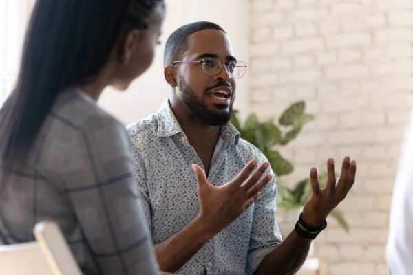 Head,Shot,Young,African,American,Male,Psychologist,Meeting,Patients,At